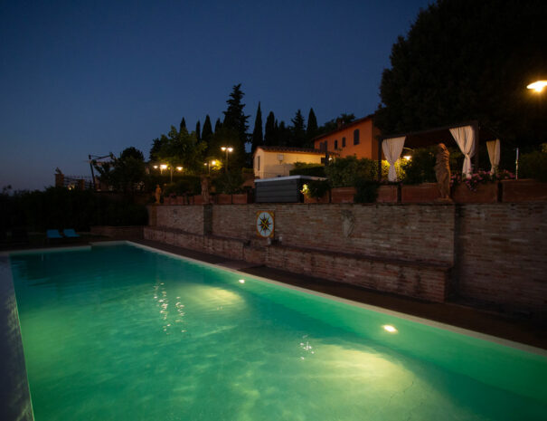 timeless-tuscany-villa-bellavista-swimming-pool-night-terrace